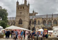 Visitors arriving at the Exeter Craft Festival on Cathedral Green.